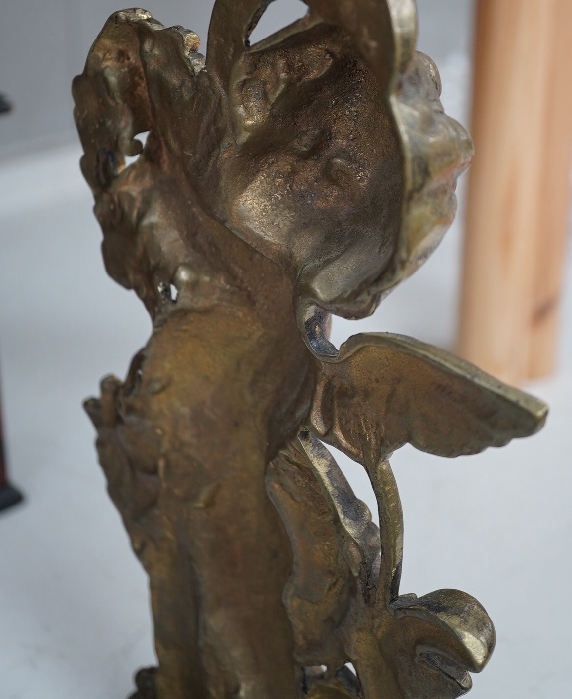 A Victorian style brass cherubic doorstop, 49cm high. Condition - some scratches to base.